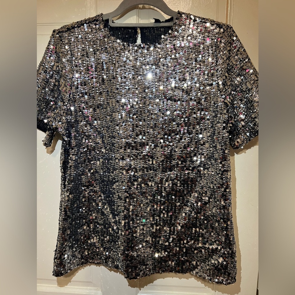 Express silver sequence top in a size medium
